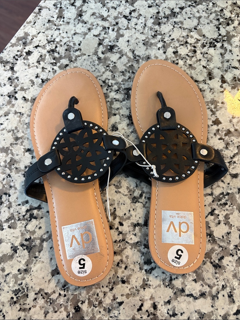 DV by Dolce Vita Black Cutout Medallion Thong Sandals - Picture 1 of 5